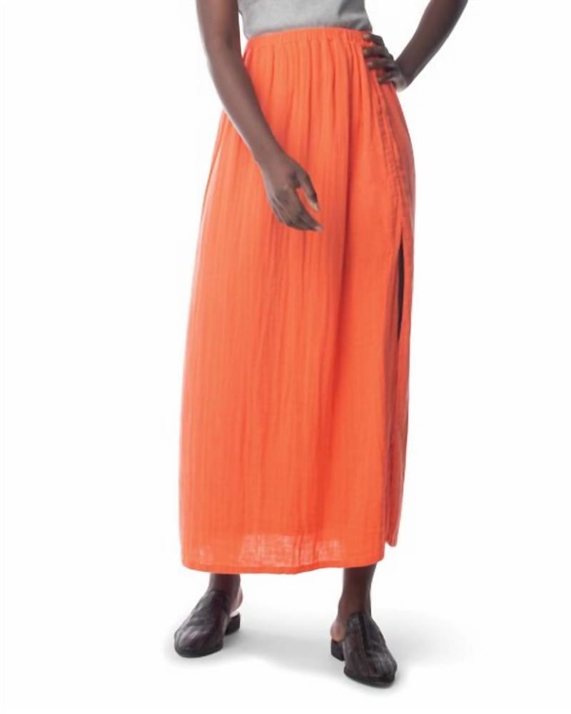 Front of a model wearing a size L Laylin Skirt in Hot Coral in Hot Coral by Synergy Organic Clothing. | dia_product_style_image_id:343413